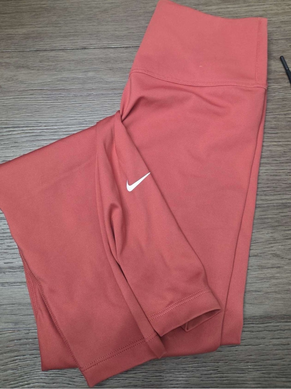 Nike Coral-Red Workout Leggings with White Swoosh